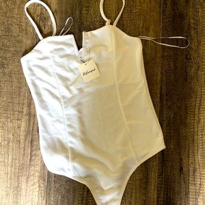 REVAMPED white snap bodysuit